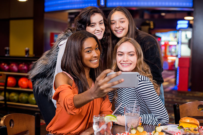 girls taking a selfie